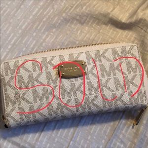 SOLD Michael Kors jet set continental